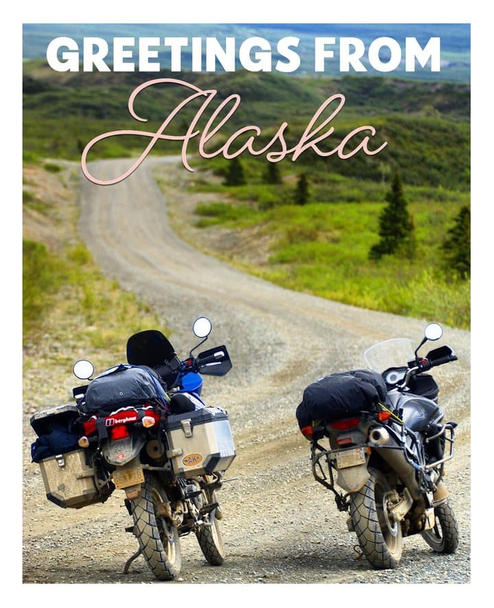 A polaroid: two loaded motorbikes on a gravel road, captioned Greetings from Alaska